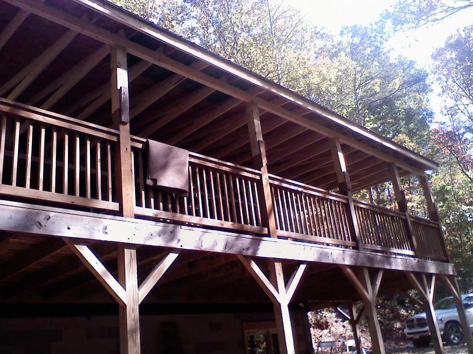 Timber framing under a new elevated porch and deck — Roof Leak Repair in Lisbon Falls by Roofing Brothers